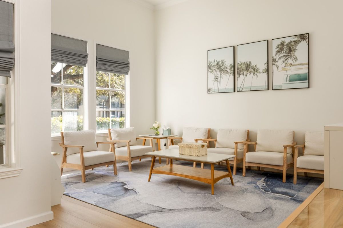 The Vitality waiting room with a basket of toys and rows of chairs